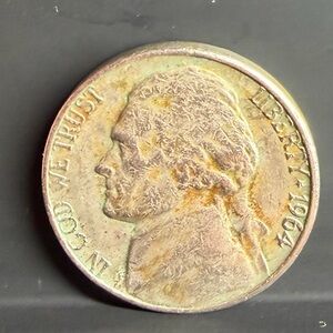 1964 US nickel, good condition.